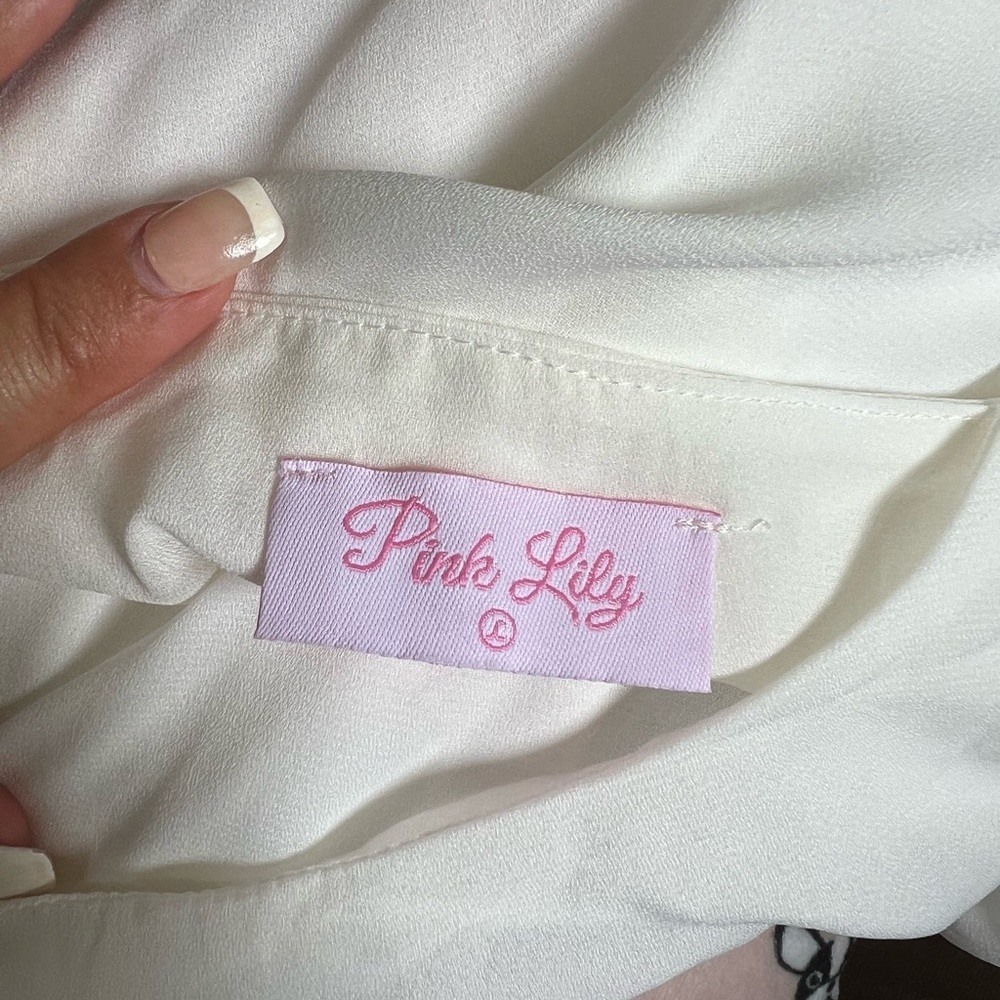 Pink, white and black loose, fit pink lily top